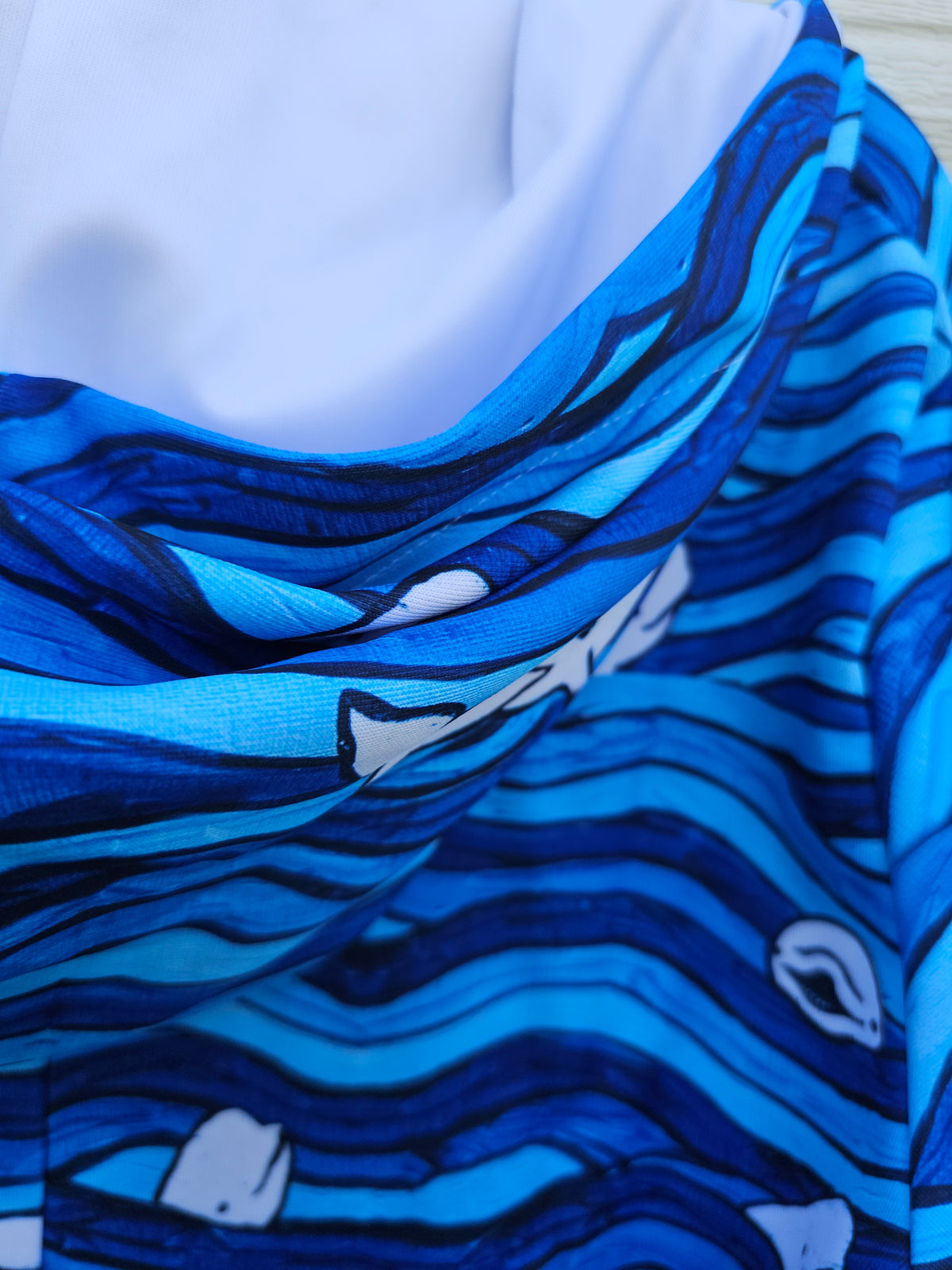 Blissful Beluga Athletic material Adult Onesie