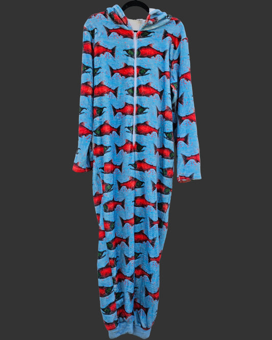 A full-length hooded one-piece pajama or onesie . The fabric is light blue with an allover print of red fish with green and black outlines.